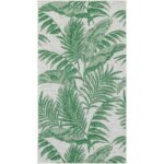 Tissu tropical vert à motifs de feuilles de palmiers.