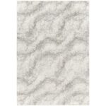 Tapis texturé gris moderne pour intérieur.