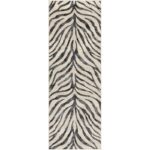 Tapis motif zèbre contemporain en noir et blanc.