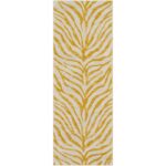 Tapis moderne jaune à motifs feuilles zébrées.