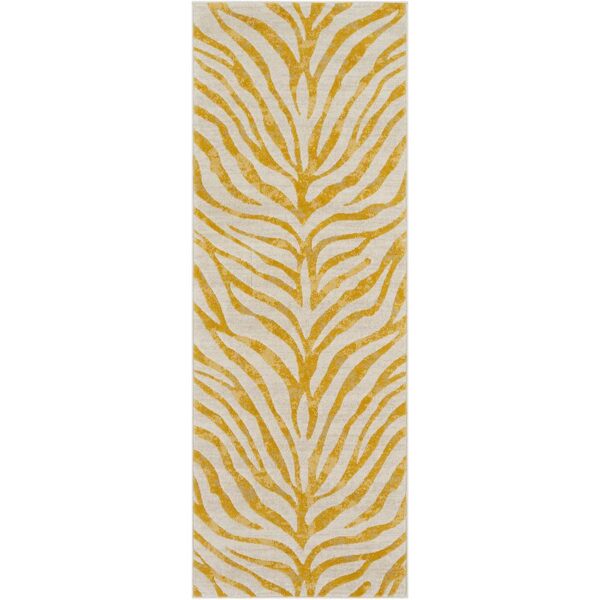 Tapis moderne jaune à motifs feuilles zébrées.