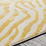 tapis à motifs ondulés jaunes et blancs