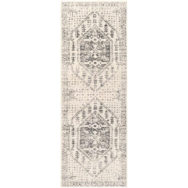 Tapis oriental beige à motifs.