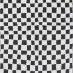 Tissu à motif damier noir et blanc.