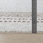 Tapis texturé avec mètre pour mesure dimension.