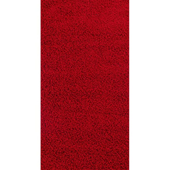 Moquette rouge texturée en gros plan.