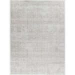 Tapis beige avec motifs géométriques traditionnels.