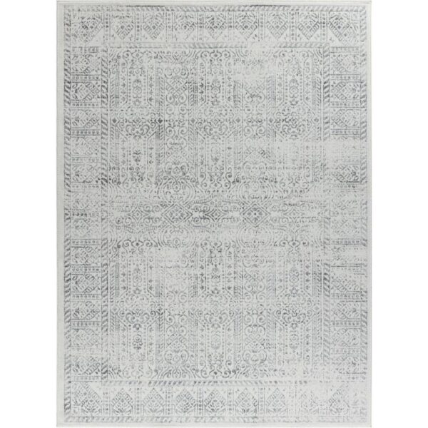 Tapis oriental gris à motifs traditionnels.