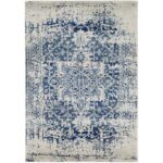 Tapis persan bleu et blanc vintage