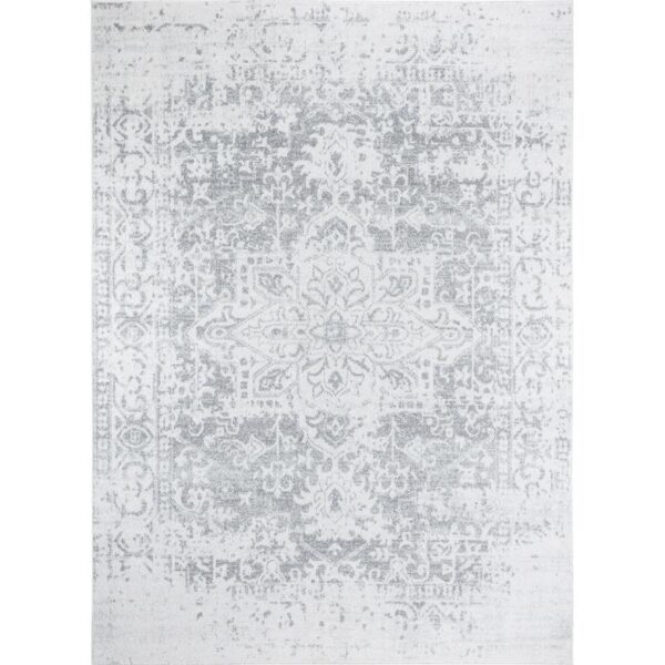 Tapis vintage gris à motifs.