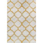 Tapis motifs arabesques dorées et gris.