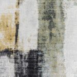 Tapis contemporain aux motifs abstraits en gris et jaune.