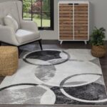 Tapis moderne, salon élégant, mobilier design, intérieur lumineux.