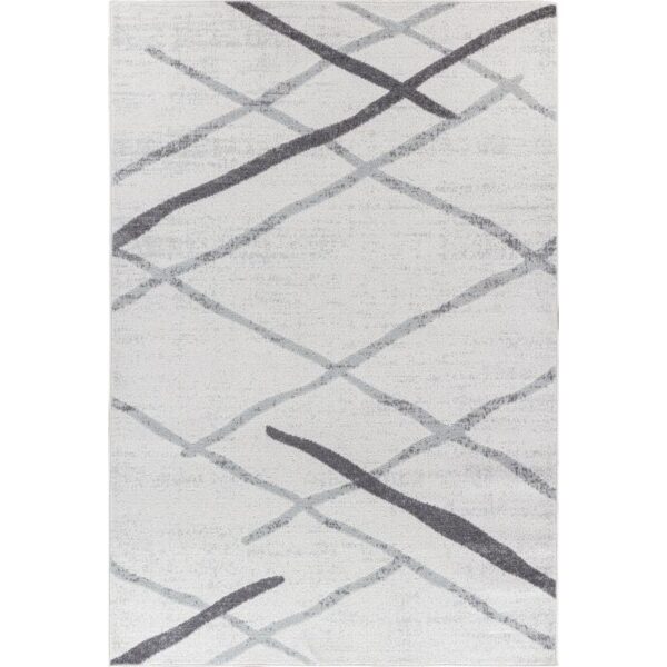 Tapis moderne gris avec motifs abstraits.