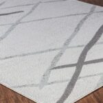 Tapis moderne géométrique gris et blanc.