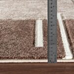 Tapis avec règle mesurant l'épaisseur.