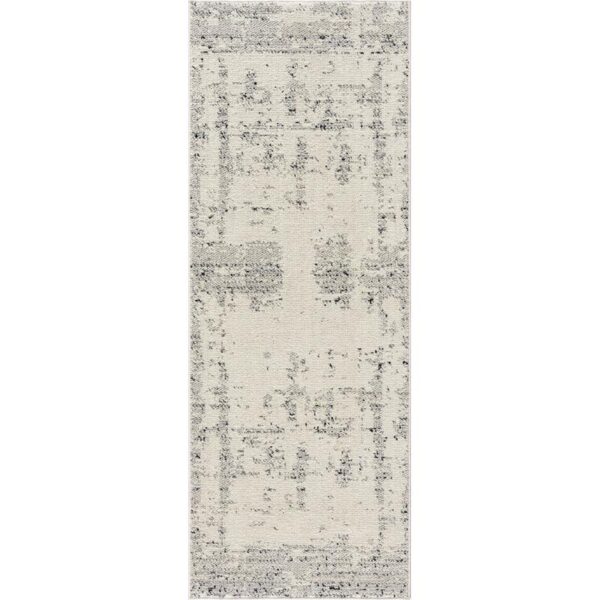 Tapis moderne gris et blanc effet vieilli.