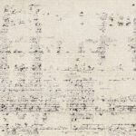 Tapis texturé abstrait en noir et blanc.