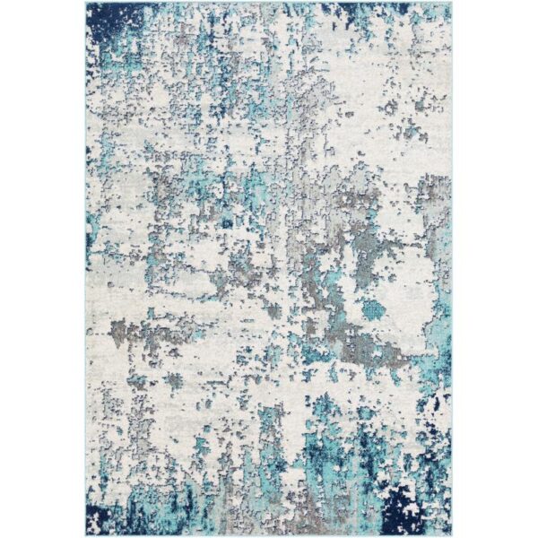 Tapis moderne aux motifs abstraits bleus et gris.
