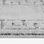 Tapis gris texturé en gros plan.