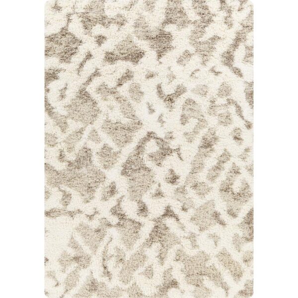 Tapis moelleux beige à motifs géométriques.