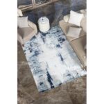 Tapis moderne bleu dans salon élégant.