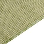 Tapis vert texturé en gros plan