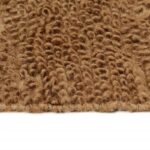 Tapis brun à texture bouclée.