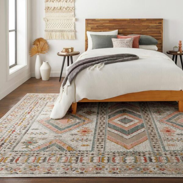 Chambre moderne avec tapis géométrique et lit en bois.