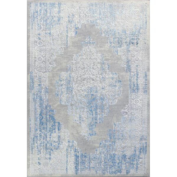 Tapis gris et bleu avec motifs.