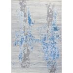 Tapis moderne gris et bleu au design abstrait.
