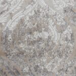 Tissu damassé avec motif floral élégant.