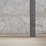 Mètre ruban sur tapis texturé en gros plan