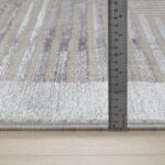 Tapis rayé avec mètre pour mesure épaisseur.
