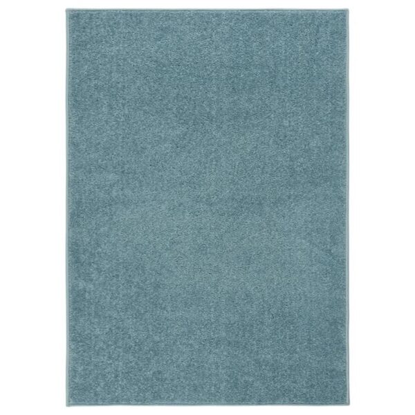 Tapis bleu clair moderne pour intérieur.
