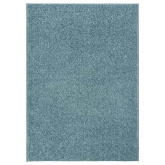 Tapis bleu clair moderne pour intérieur.