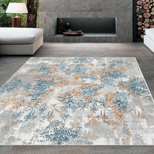 Tapis contemporain bleu et orange pour décoration de salon.