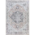 Tapis persan vintage aux motifs complexes.